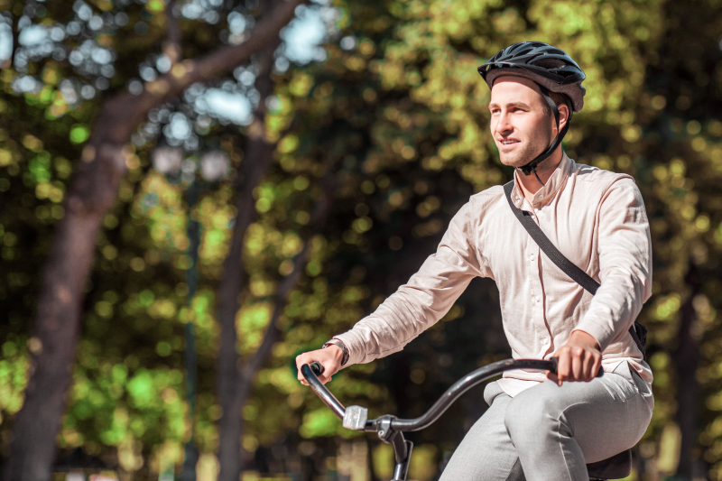 man-riding-bike-safely-with-helmet